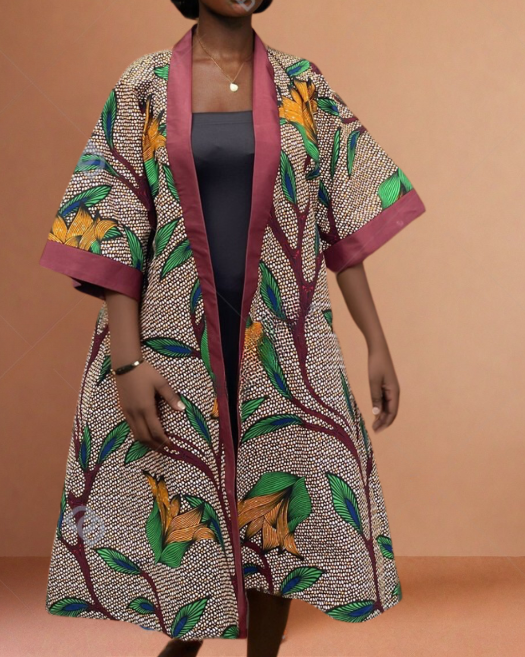 Flora Afrobe – Bold African Print Dress with Elegant Flair